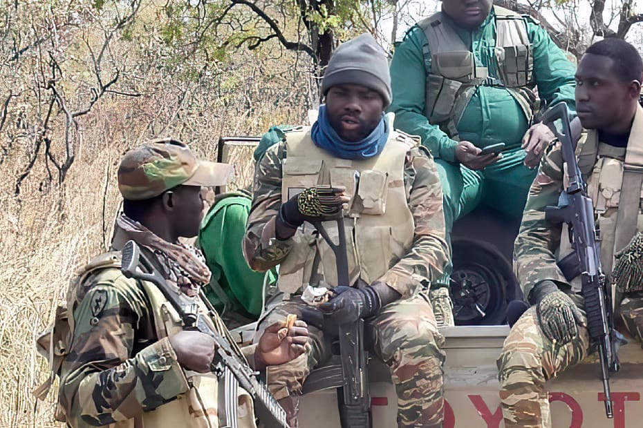 Soldiers on the back of a Toyoya bakkie.